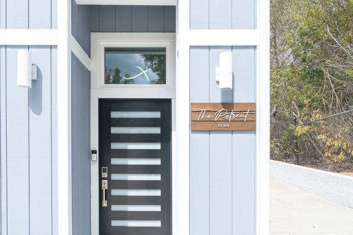 “The Retreat” entry sign
