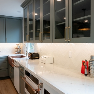 Upper glass cabinets with interior lighting