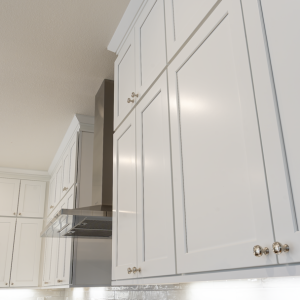 Upward angle of full-height stacked white shaker cabinets flanking stainless range hood and crown trim