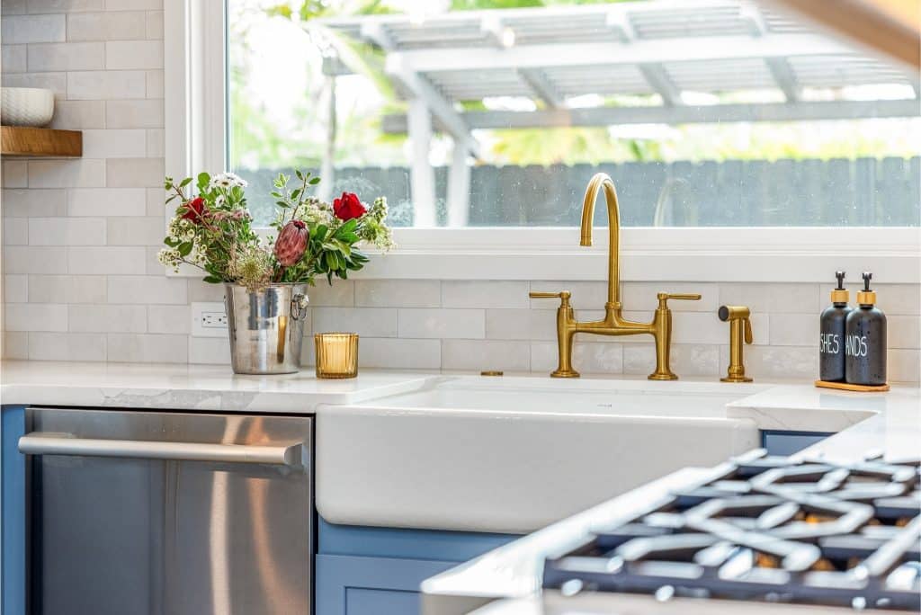 Kitchen farmhouse sink with brushed gold faucet and fixtures Trend
