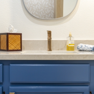 Close-up of Delta Velum single-hole faucet on MSI Lumataj quartz