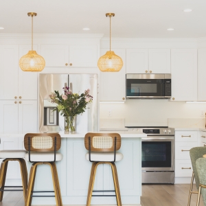 Island view with seagrass pendants and brass hardware