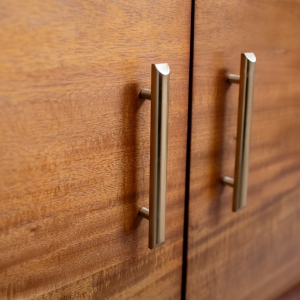 Brass cabinet pulls on the primary bathroom vanity